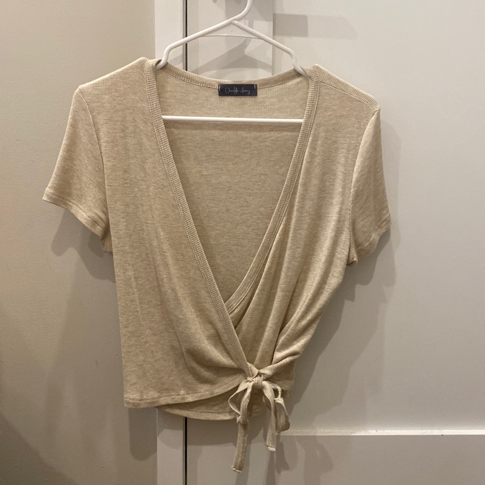 Beige short sleeved, soft v-neck wrap crop top